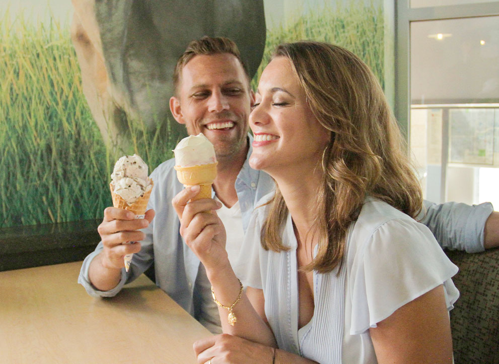 Young couple eating ice cream at SDSU Dairy Bar