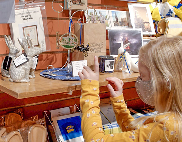 Girl looking at museum gift shop